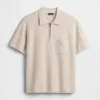 Swetr polo oversize z kieszenią i zamkiem do połowy