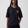 T-shirt z nadrukiem Tlc o luźnym kroju