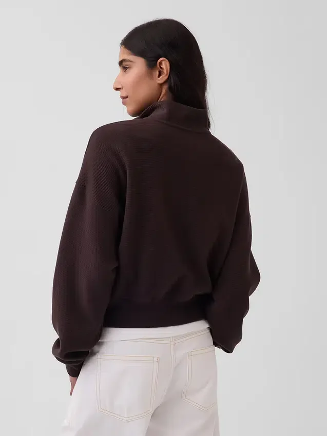 Teksturowana bawełniana bluza oversize z półzamkiem
