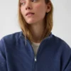 Teksturowana bawełniana bluza oversize z półzamkiem