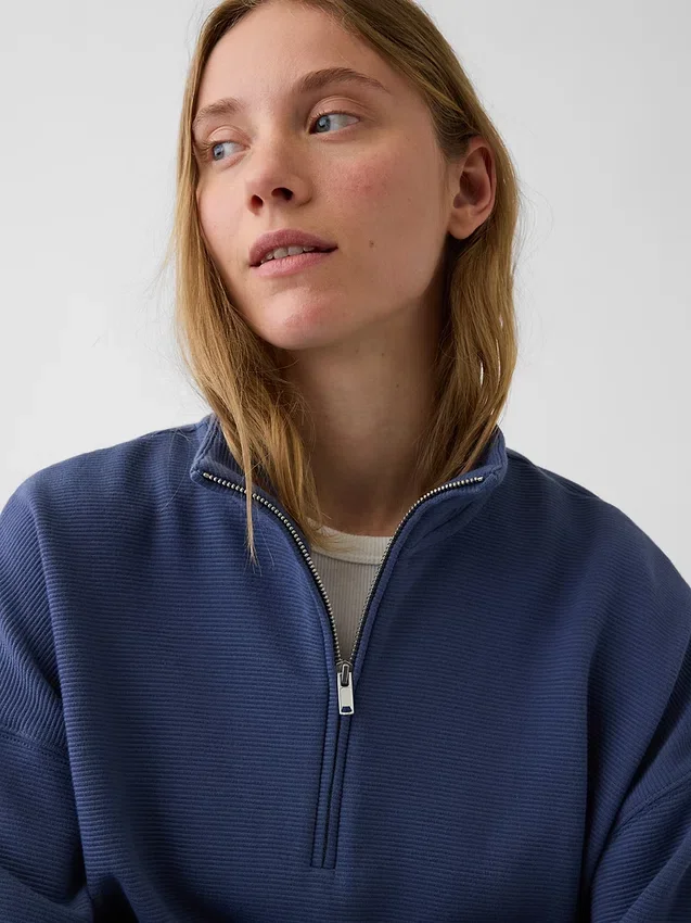 Teksturowana bawełniana bluza oversize z półzamkiem