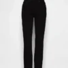 Vintage Slim Jeans o średnim stanie
