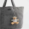 Wisiorek do torby z motywem bluzy z kapturem Brannan Bear